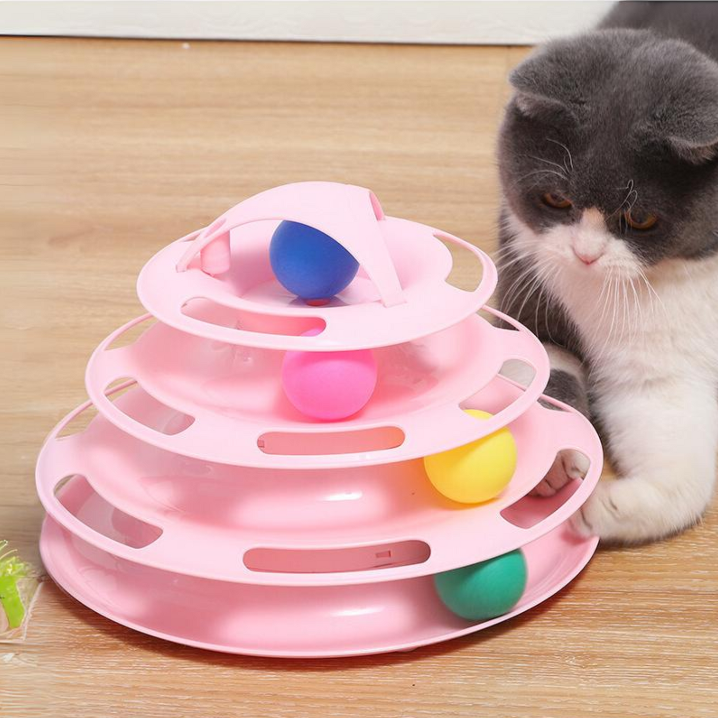 Juguete torre para gatos rosado